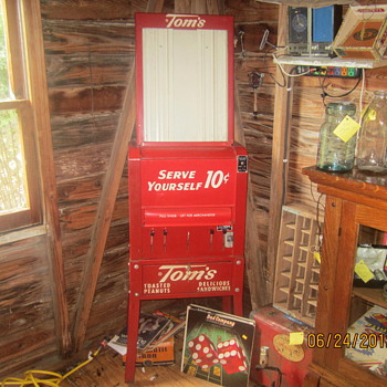 Mint Toms 5 cent machine. - Advertising