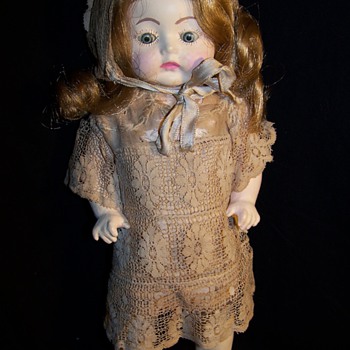Antique Doll ...Who is the maker ?