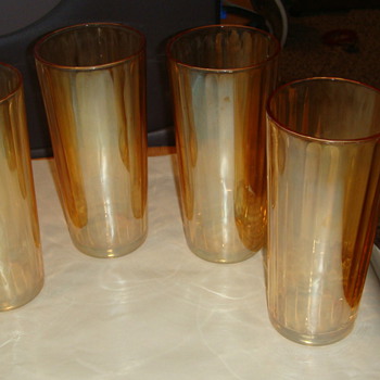 Glass creamer found in box along with 4 Colored sparling glasses 
