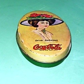 Coke sewing kit tin