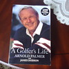 A GOLFERS LIFE ARNOLD PALMER WITHY JAMES DODSON BOOK.