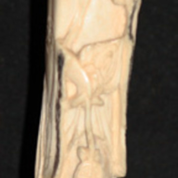 Old Asian bone carving/girl with compartment through head revealing miniscule animal carvings on seeds.