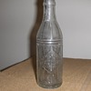 Squeeze Orange Soda Bottle Embossed 1924