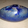 Large torpedo shaped blue and silver art glass vase with applied rim