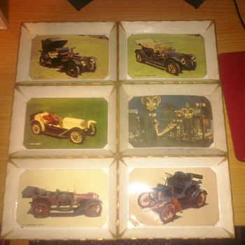 6 Plastic trays with post cards inside.