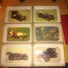 6 Plastic trays with post cards inside.