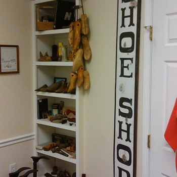 Shoe/foot collection in my office - Advertising