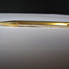 VINTAGE BRASS PENCIL WITH AQUAMARINE JEWEL