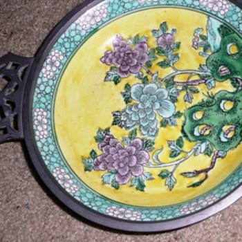 Oriental plate incased in a metal - Asian