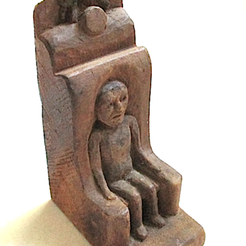 Small woodcarving of a Man in a Chair with a Cat jumping over the Moon - Folk Art