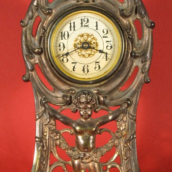 "Peerless" Cast Front Clock by Western Clock Mfg. Co, 1911 - Clocks