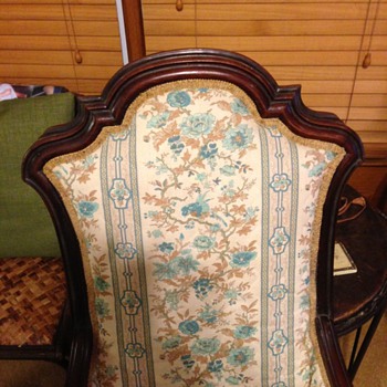 DOES ANYONE KNOW ANYTHING ABOUT THIS ROCKING CHAIR- I BOUGHT IT AT AN ESTSTE SALE
