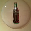 1950  24" round embossed metal sign