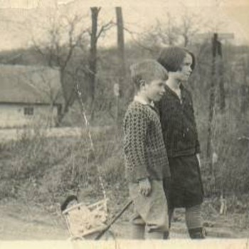 Mom and my Uncle and a Lucky doll - Photographs