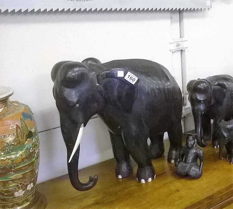 Extremely heavy antique ebony elephant with ivory tusks (1 of 5