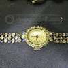 OLD WEST 17 WATCH WITH BLUE AND CLEAR STONES.