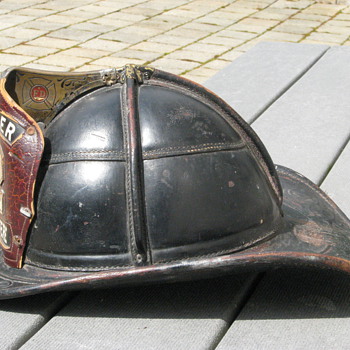 Antique leather firefighting helmet