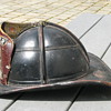 Antique leather firefighting helmet