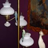 Birds and tension pole lamp.