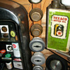 Chevrolet and Oakland Hubcaps and Texaco can