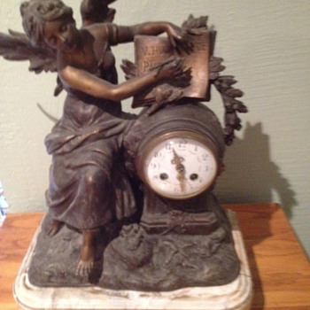 Antique French mantel clock. Cast angel writing V. Hugo Pasteur.  - Clocks