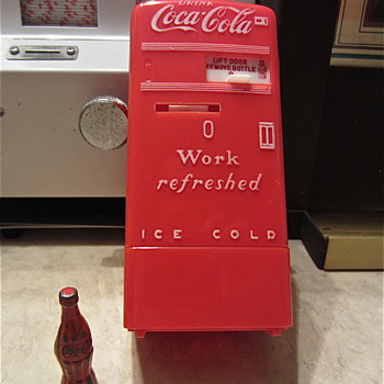 Coca cola Toy Bank 1950s era and Coca Cola Pencil Sharpener 1930s