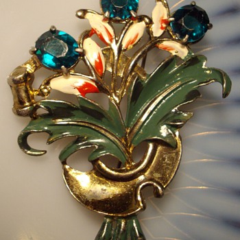 Early floral figural enamel rhinestone brooch.