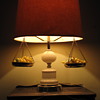 Old Lamp with weight balance and green grapes