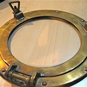 Brass porthole. - Military and Wartime