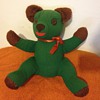 Able to identify this beautiful old green bear?