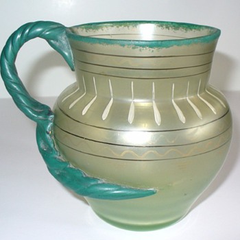 A very unusual Loetz Olympia pitcher!
