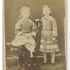 CDV of two sisters using a stereo camera as a footrest