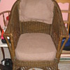 A wicker chair. 