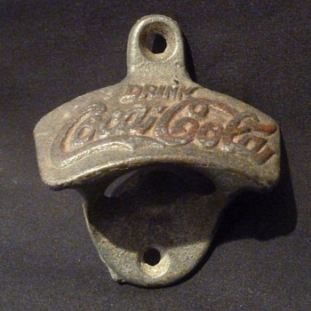 A Coca Cola Bottle Opener - Age Unknown