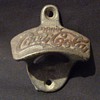 A Coca Cola Bottle Opener - Age Unknown