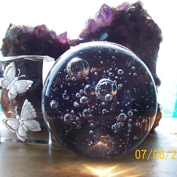 Ok I have Glassware :-) well two  . Bubble paperweight display 