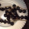Trifari black cut glass bead bracelet & flapper necklace.