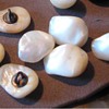 7 mother of pearl buttons