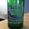 Green glass S&O'K brand bottle