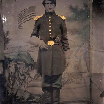Tinted tintype of Civil War soldier with Colt pistol