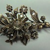 Rose gold flower brooch with European rose cut diamonds