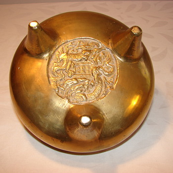 Asian brass footed bowl with dragon marks