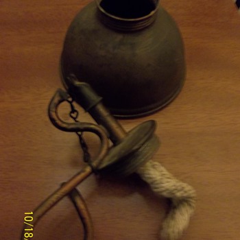 Oil lamp? Very primitive.