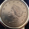 Gold Liberty Coin in Money Holder