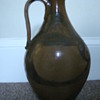 Huge handled jug, signed
