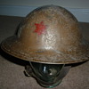 WW1 British made steel helmet with Brodie stamp in the liner.