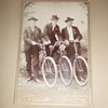 Cabinet card of three Wisconsin bicycle riders c. 1890s