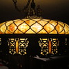 Slag chandelier electrified with original gas works.