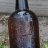 <<<J. Moore Old Bourbon Whiskey Bottle>>>