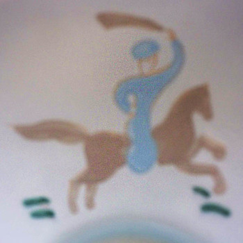 Porcelain Bowl,  Handpainted Figure of Arab on Horse with Sword.  Faience? Any Guesses?